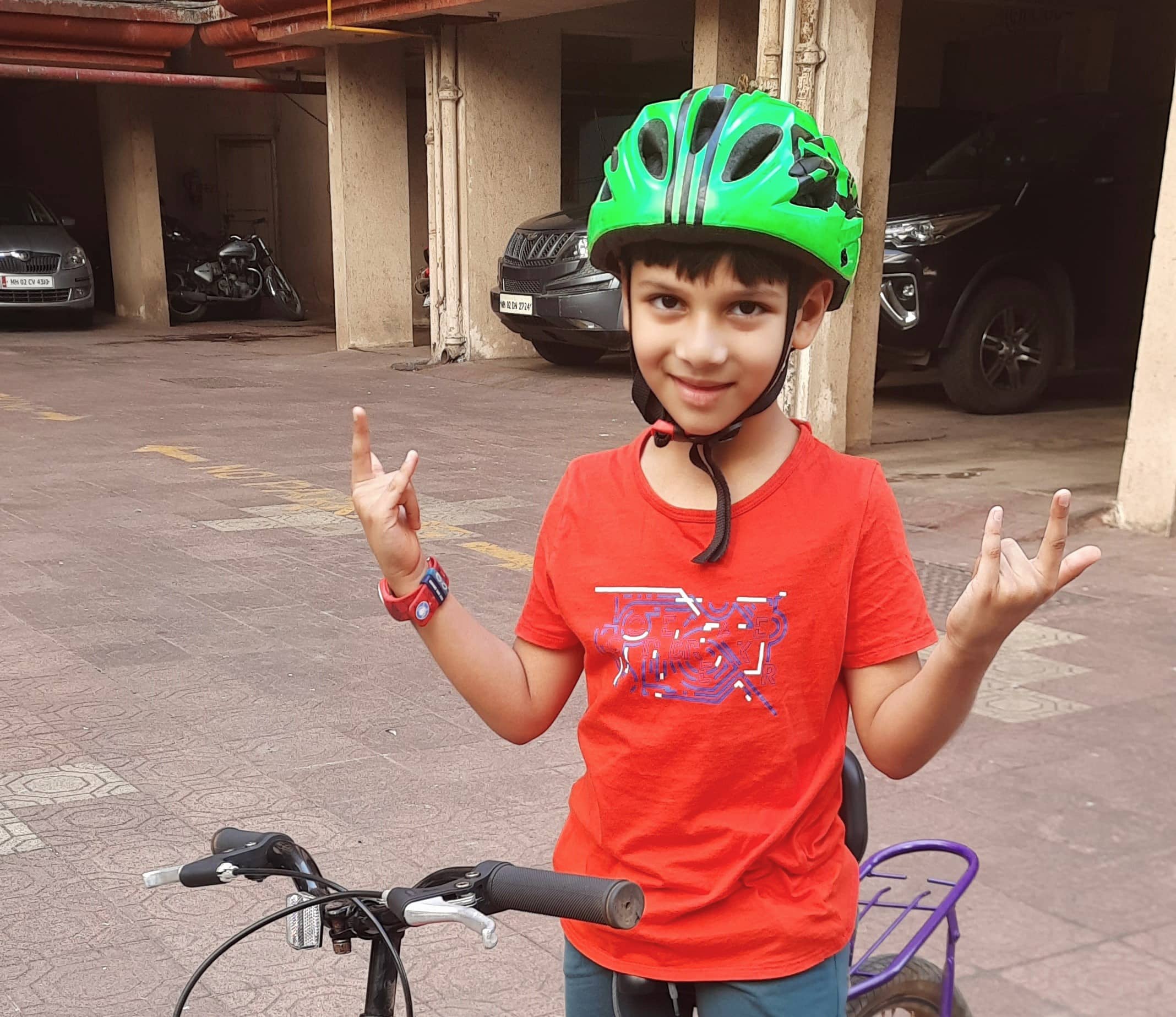 A boy giving a swag pose learning cycle with wheelofit